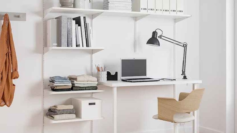 White desk and shelving