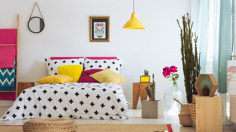 bedroom with colorful decor and plants