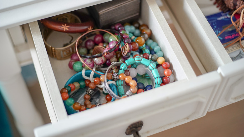 Colorful bracelets in white drawer