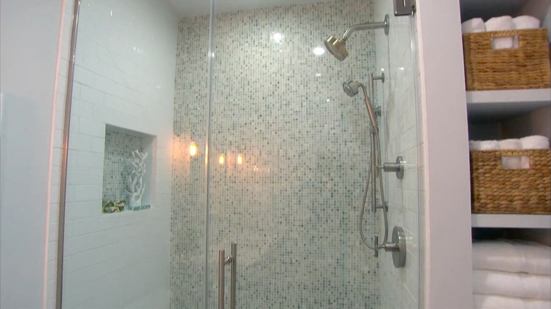 A tiled shower designed by Hilary Farr