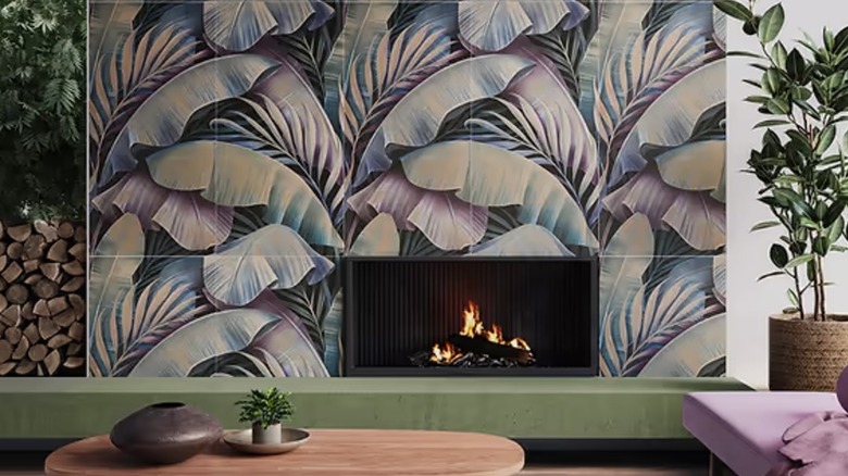 Large-format leaf print tiles surrounding a fireplace