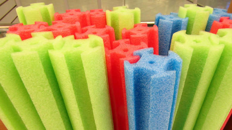 Pool noodles in a store