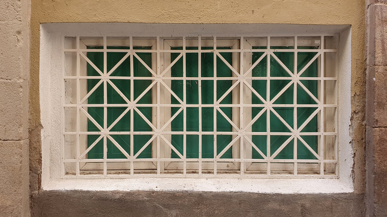 A window grille over a window