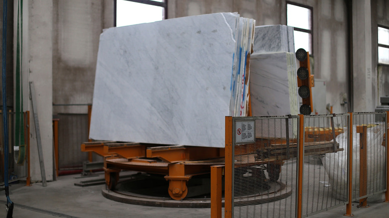 A stack of marble slabs in a warehouse