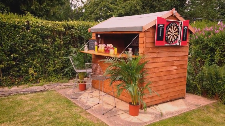 Small shed converted into backyard bar