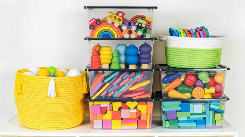 Storage bins with baby toys