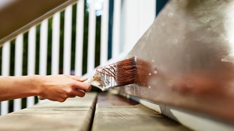 painting stairwell with brown paint