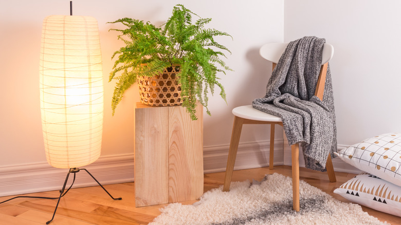 Columnar rice paper lamp in seating area