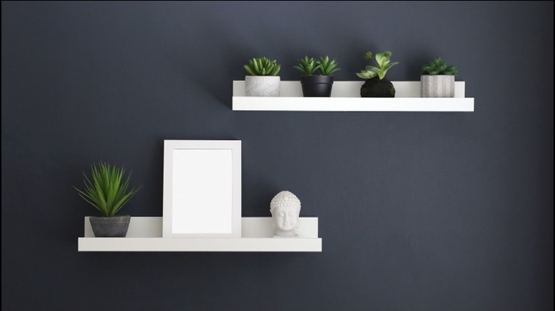 offset floating shelves with accessories