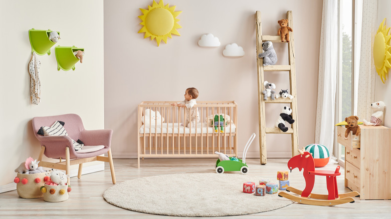 baby nursery with area rug