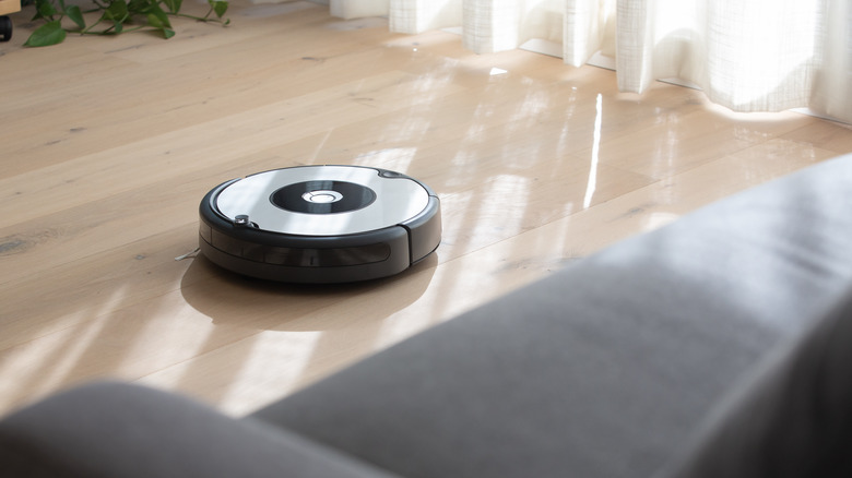 Robotic vacuum cleaning floors