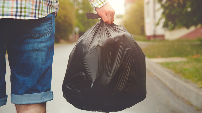 Man taking out garbage