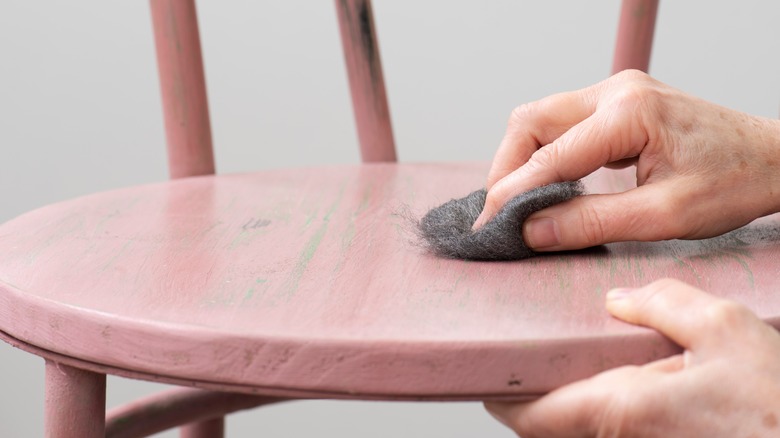 Using steel wool on a chair