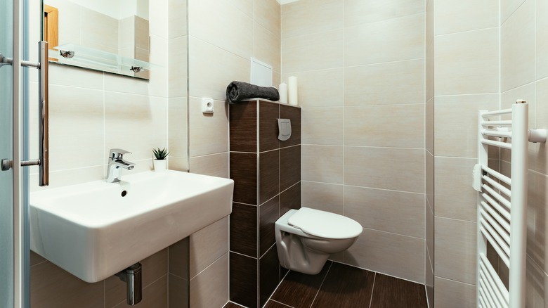 Bathroom with black and white tiles