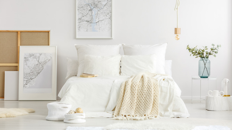 bedroom with cozy white bedding