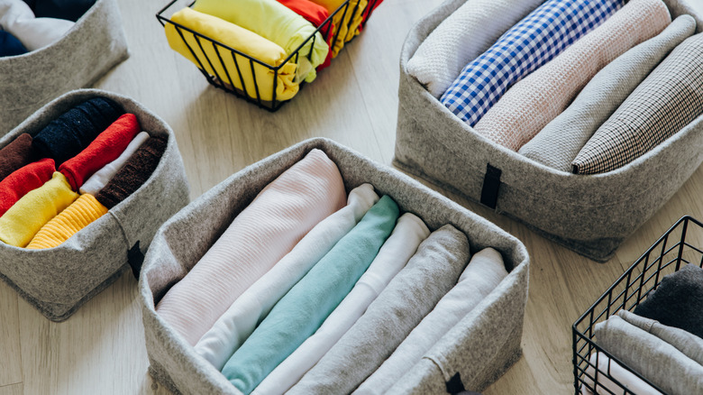 clothes organized in bins