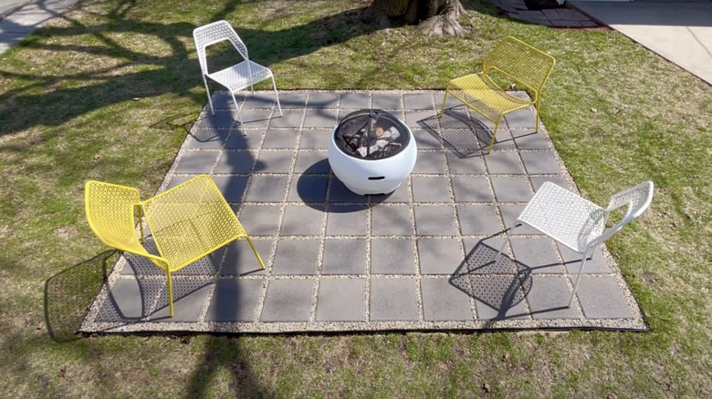 Paver patio with chairs and firepit