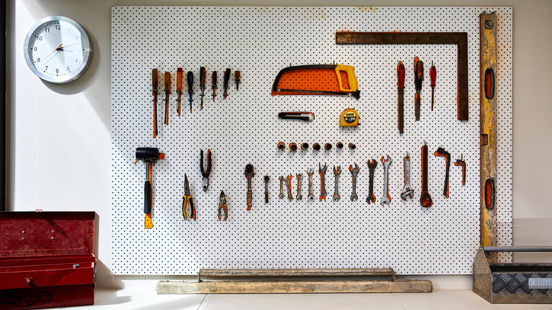 pegboard storage with hanging tools 