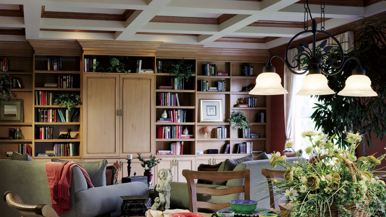 A living room with a coffered ceiling