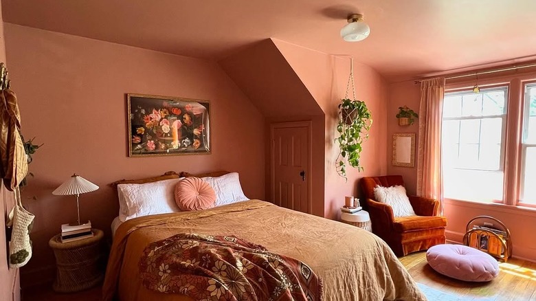 A coral color drenched room