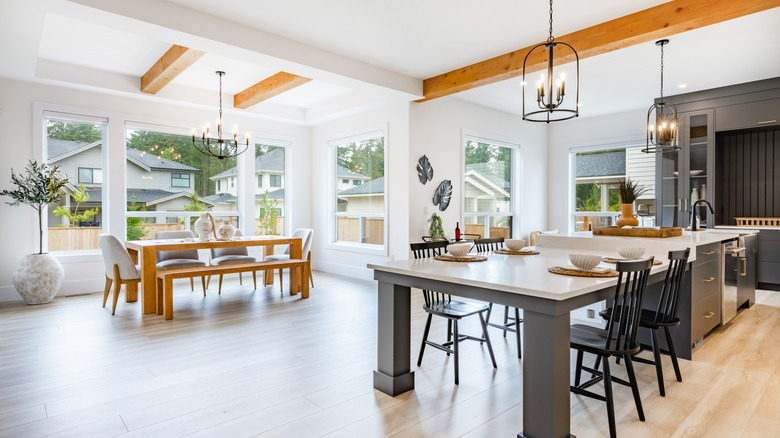 A kitchen with architectural beams