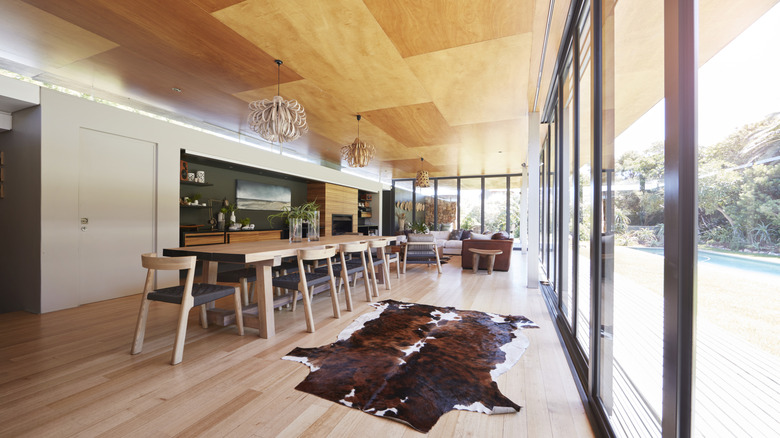 A room with a wooden ceiling