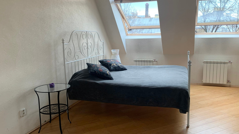 An attic is shown with bamboo flooring.