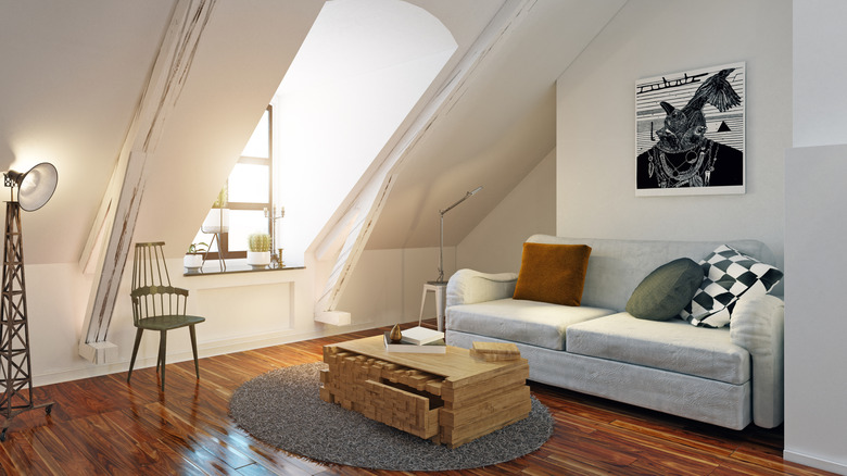 A modern finished attic is displayed.