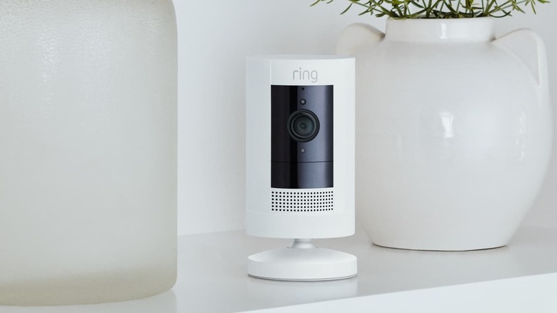 white Ring camera on modern shelf