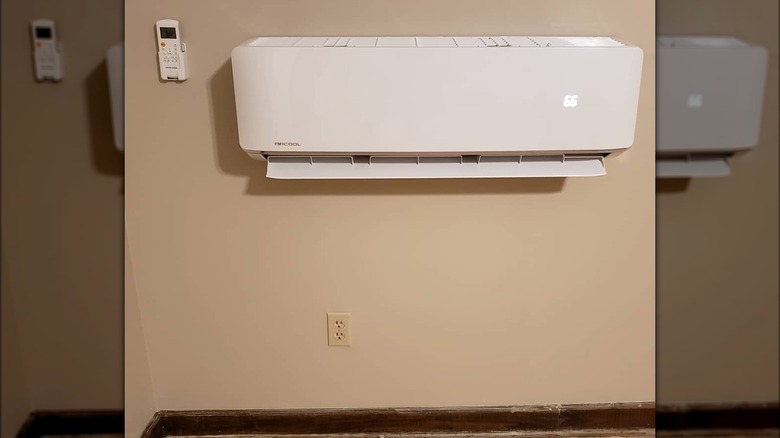 Mini split AC with remote on wall