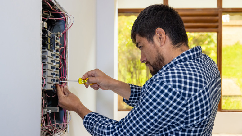 Electrician upgrading a breaker box