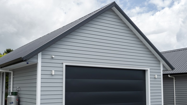 garage with gable metal roof