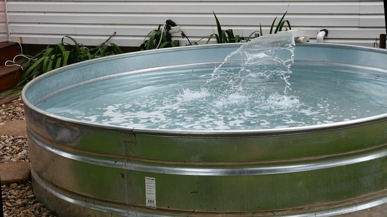 Stock tank pool in yard