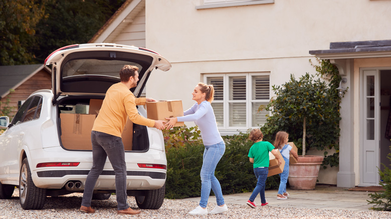 Kids help parents on moving day