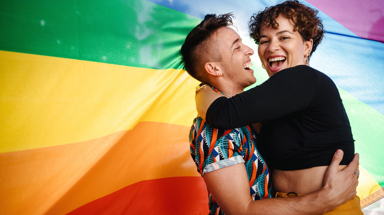 couple with a pride flag