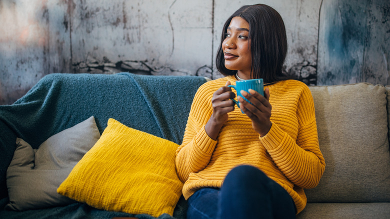 Woman enjoying cup of tea