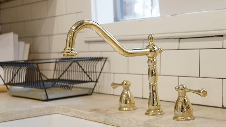 brass kitchen faucet and sink