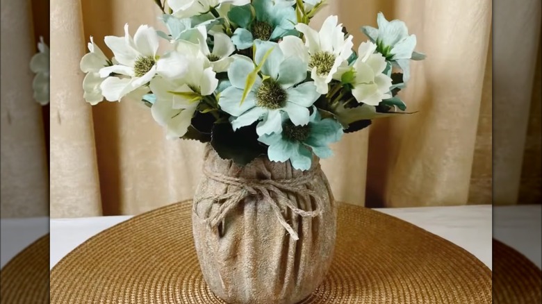 Custom made cloth covered mason jar centerpiece