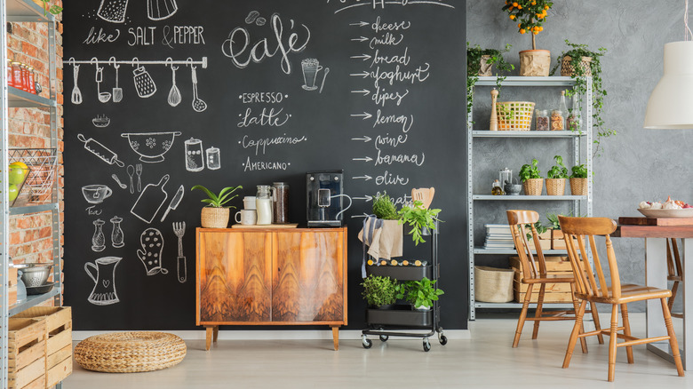 Chalkboard accent wall against small coffee bar