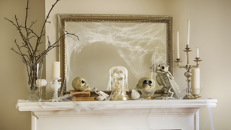 Halloween decorations on neutral fireplace