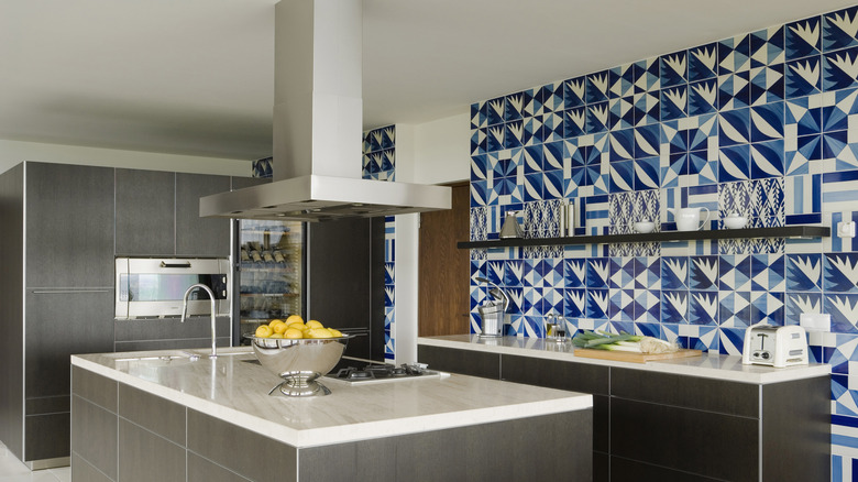 Patterned tile wall in kitchen