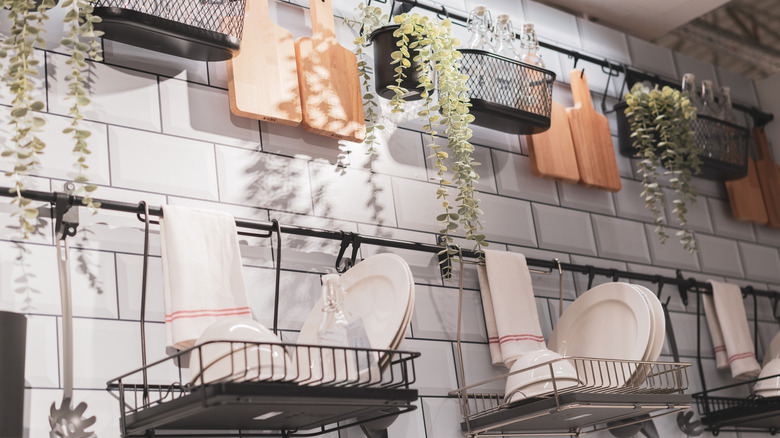 Hanging baskets from kitchen wall 