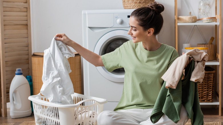 woman sorting laundry