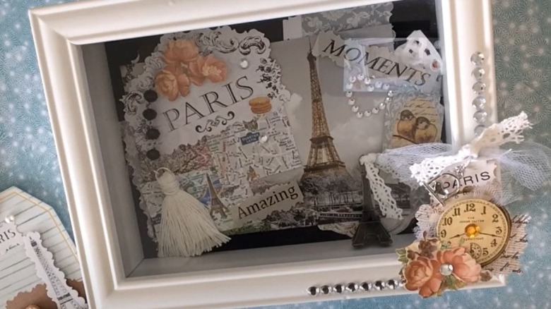 shadow box with Paris memorabilia 