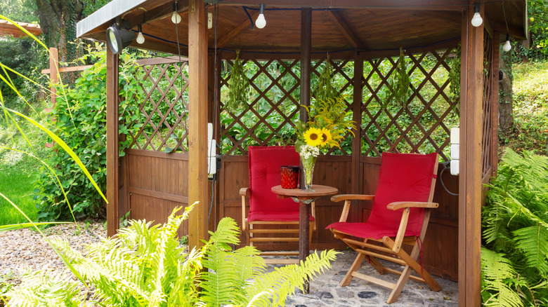 trellis pavilion with chairs