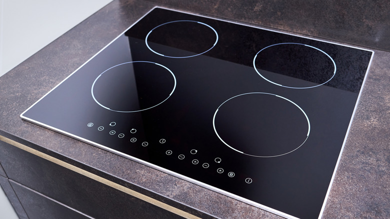 Close up of induction stove on a gray counter