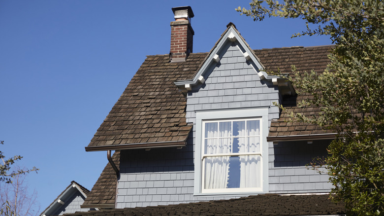 Wood roof shingles on a Victorian house