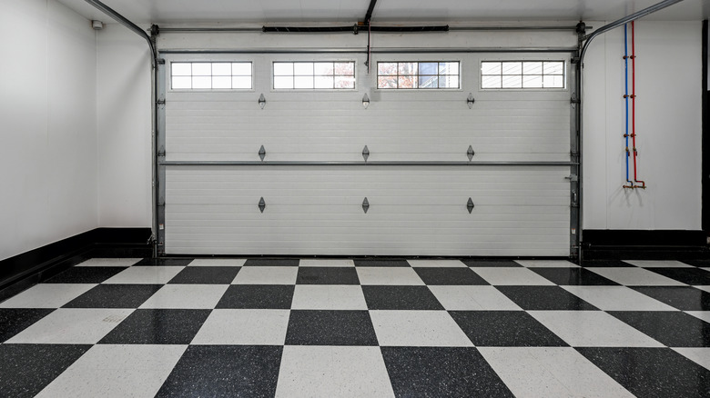 Garage with checkerboard tile floor