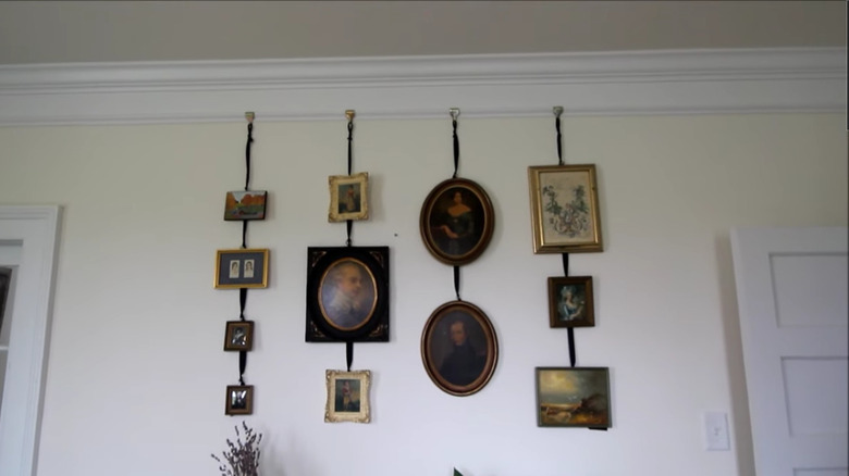 pictures hanging from picture rail molding