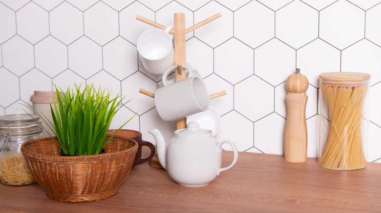 Coffee mug tree on a kitchen countertop